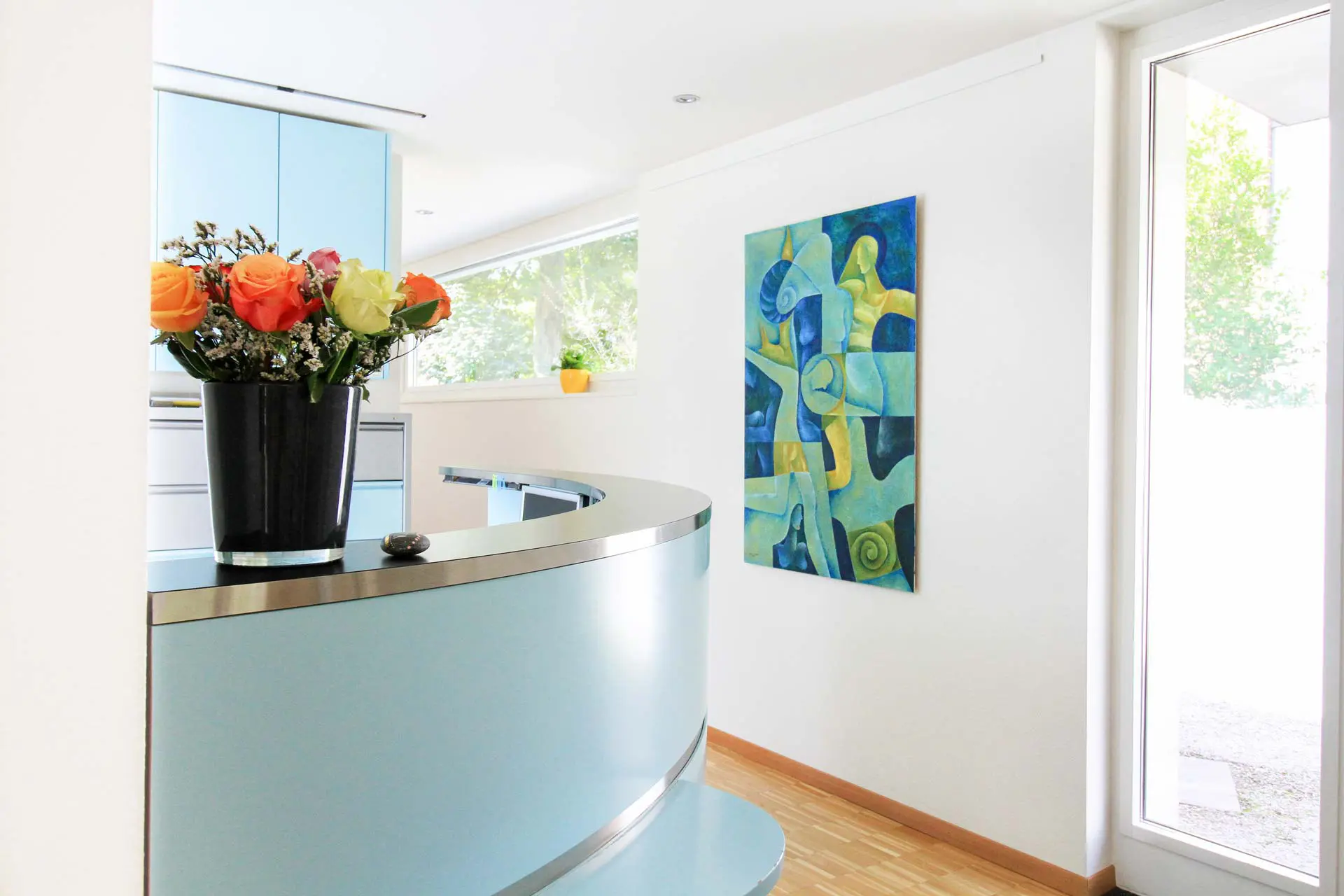 Empfangsbereich der Hausarztpraxis von Dr. Günter Lang in Riehen Empfangsbereich der Hausarztpraxis von Dr. Günter Lang in Riehen